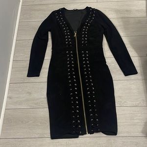 Beautiful black and gold Bebe dress in a size Large